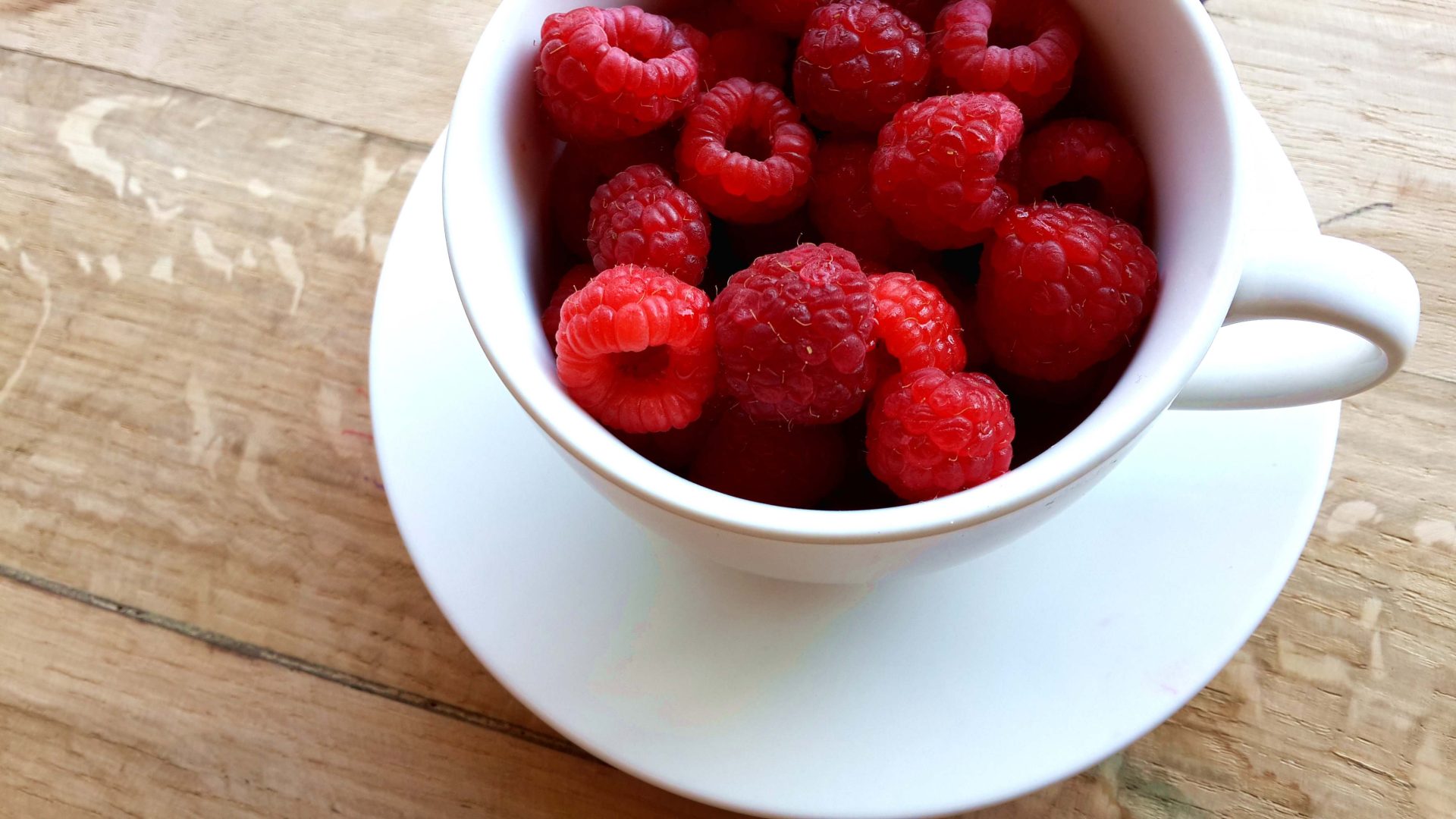 fresh-raspberries-in-a-charming-cup